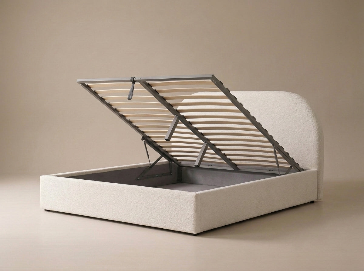 Velets Flora ivory bed with slatted lift-up base raised, showing empty storage space.